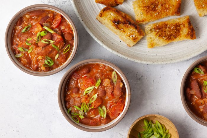 Taste of Home Kidney Beans in small ramekin sized bowls, served with toast soldiers and green onion garnish