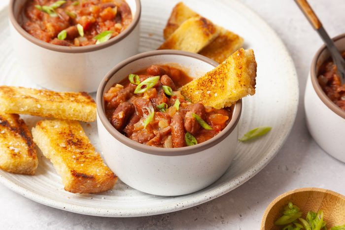 Taste of Home Kidney Beans in small ramekin sized bowls, served with toast soldiers and green onion garnish