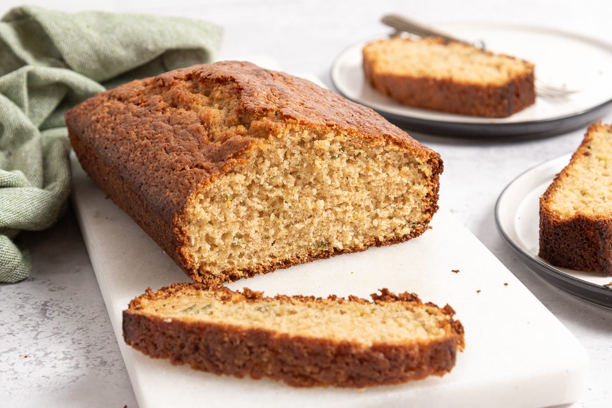 Lemon Zucchini Bread Sliced On Marble Board