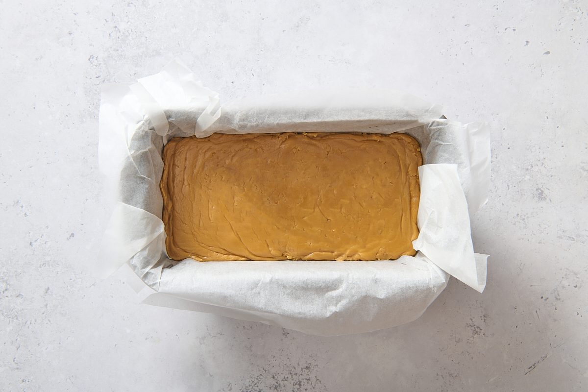 Maple fudge poured into the prepared loaf pan