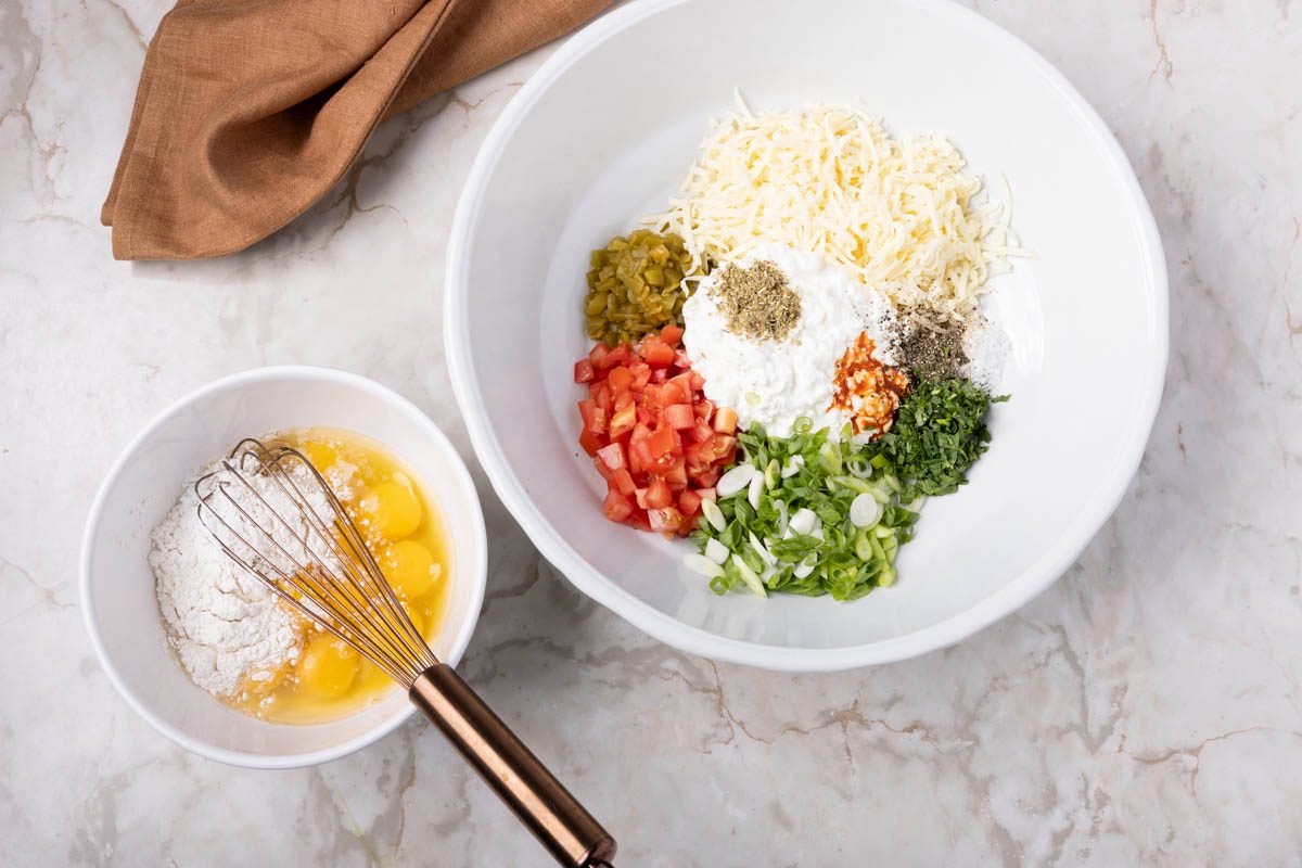 Mexican Breakfast Casserole Combined the ingredients in large white bowl