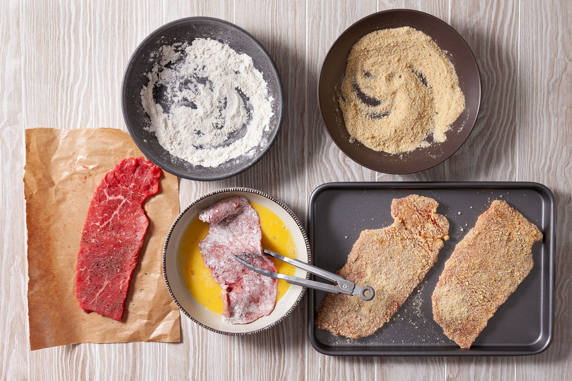 Combine the remaining seasoning mixture and breadcrumbs in a shallow bowl. Place flour and egg in separate shallow bowls.