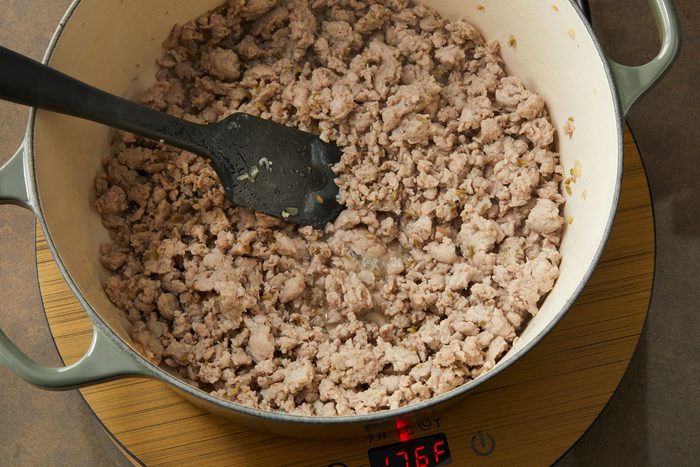 Crumbles of sausage over medium heat in a Pan