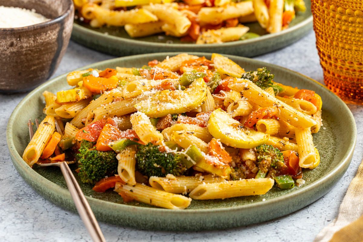Taste of Home Pasta with Veggies photo of the finished recipe served on plates.