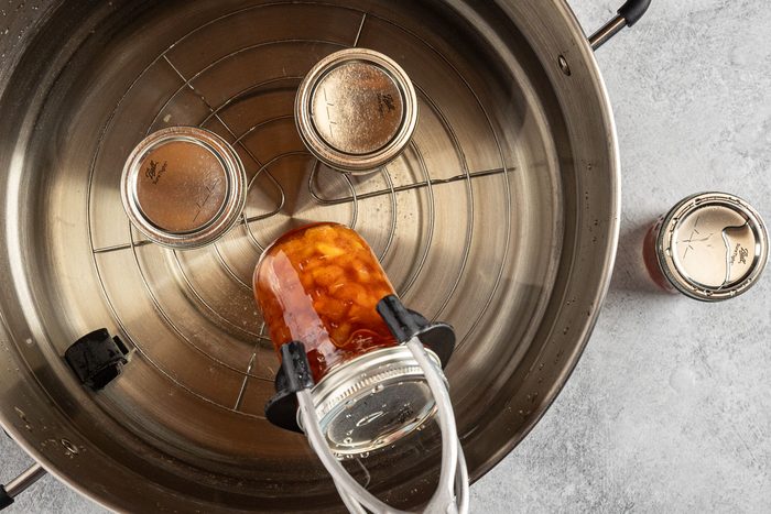 processing the jam in a water canner.