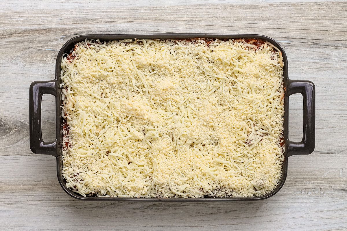 Pizza lasagna preparation, ready to bake.