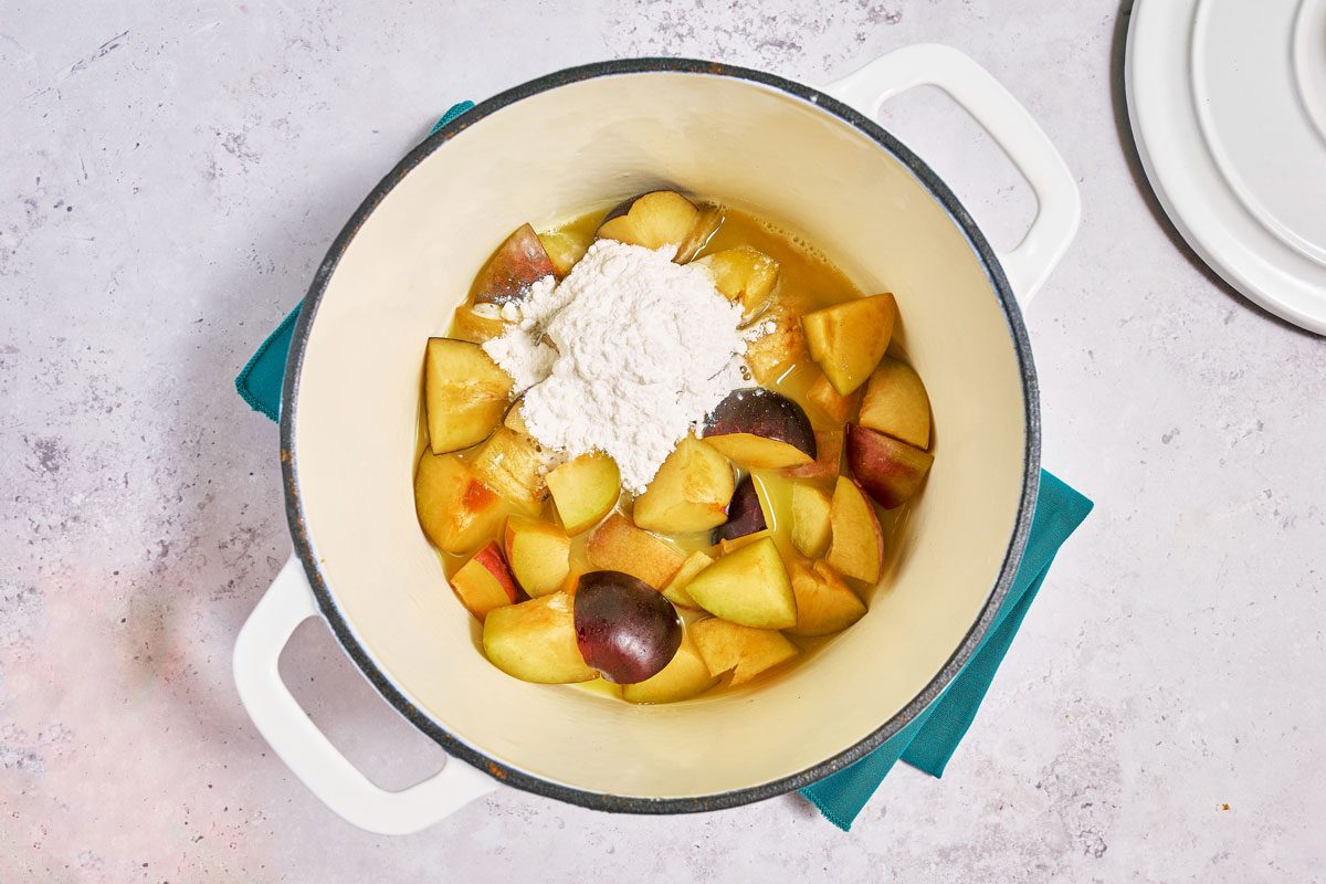 adding pectin to plums while making plum jam