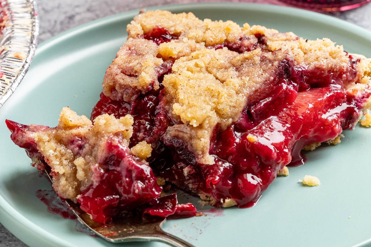 Taste Of Home Plum Pie Photo Of The Finished Recipe Cut Into Slices.