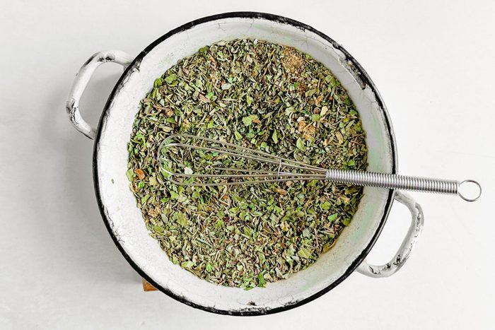 Taste of Home Popcorn Seasoning in an enamel bowl