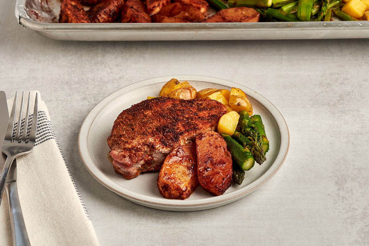 This pork chop and asparagus recipe by Taste of Home is a complete dinner cooked on a single sheet pan.