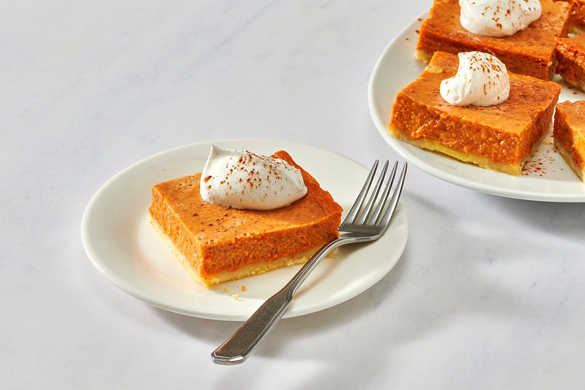 Pumpkin shortbread bars on a serving platter