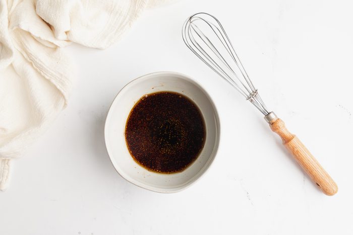 Overhead shot for Taste of Home Quinoa with Vegetables, sauce mixture in a bowl.