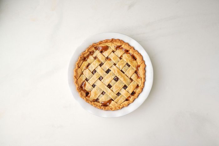 The fully baked Raisin Pie cooling , showcasing the golden-brown crust. Taste of Home's step-by-step recipe
