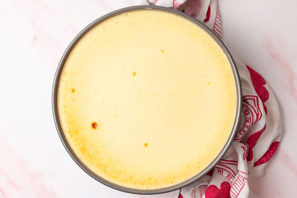 Step 4 of Taste of Home Raspberry Cheesecake is to Let the cheesecake cool in the oven for 30 minutes, or until the center is completely set. Remove it from the oven and refrigerate overnight, covering when completely cooled.