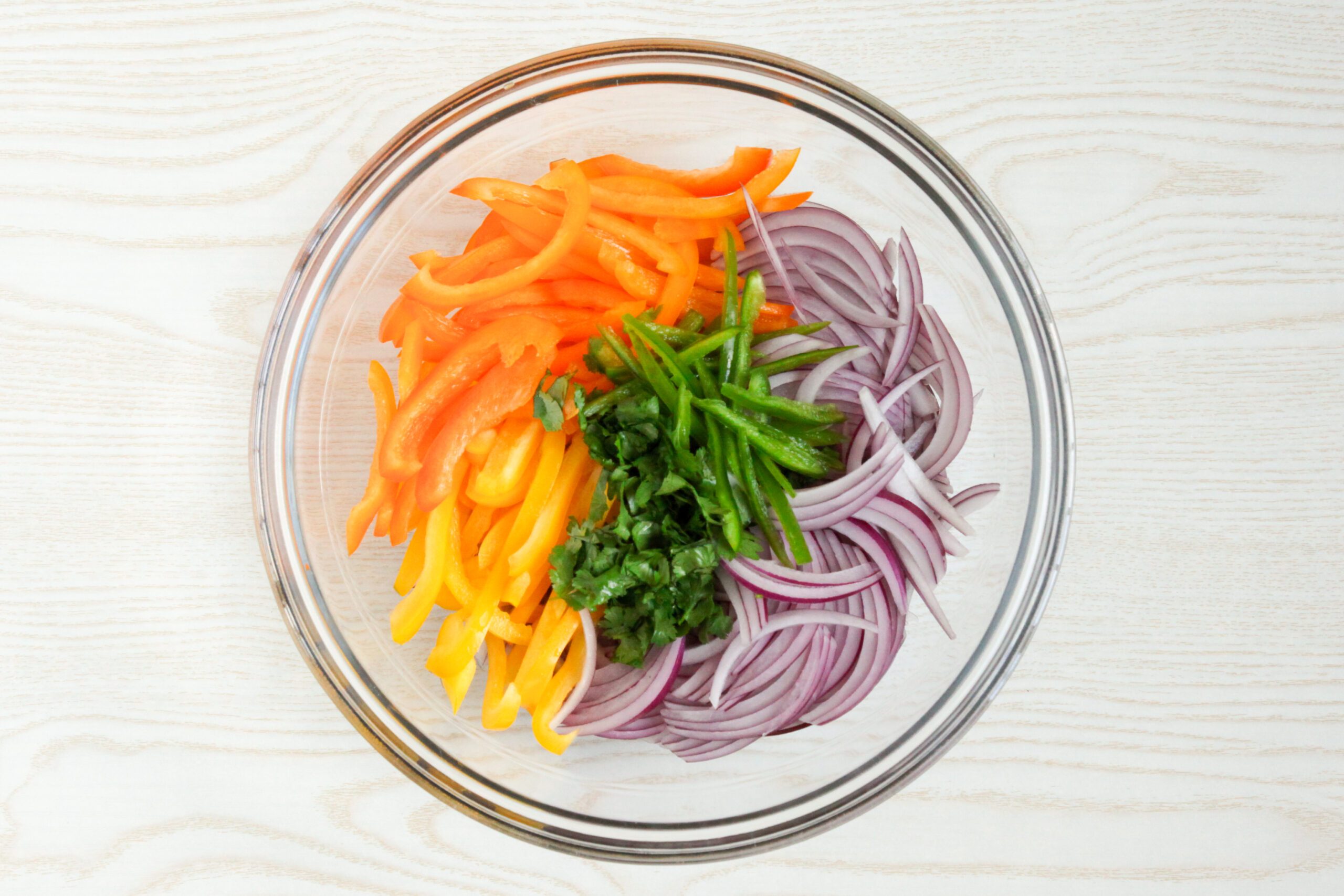 Mixing together Salsa Criolla