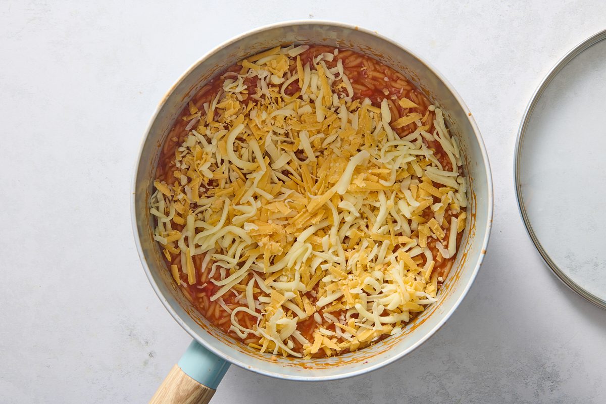 Letting the cheese melt into the rice