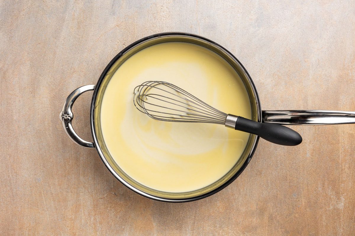 making the cheese sauce.