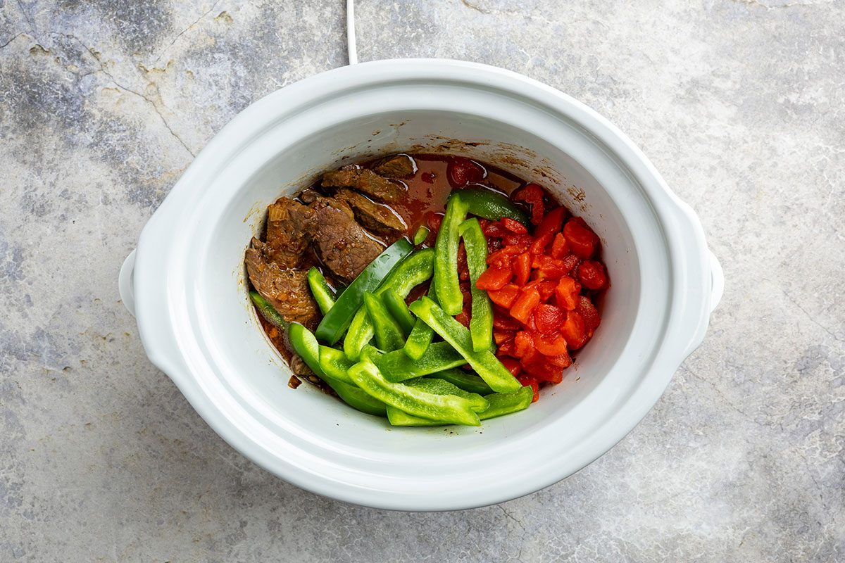 beef and vegetables added to crock pot.