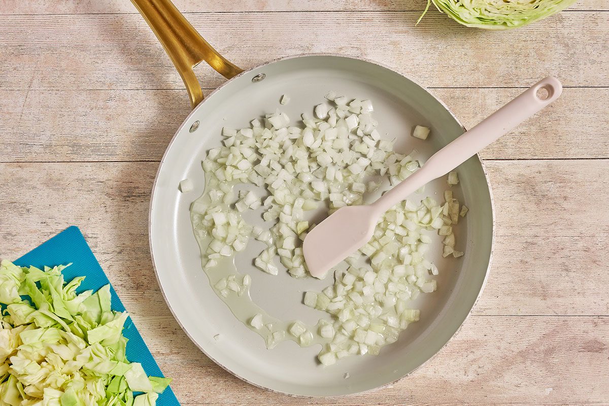 sautéing onions in a skillet
