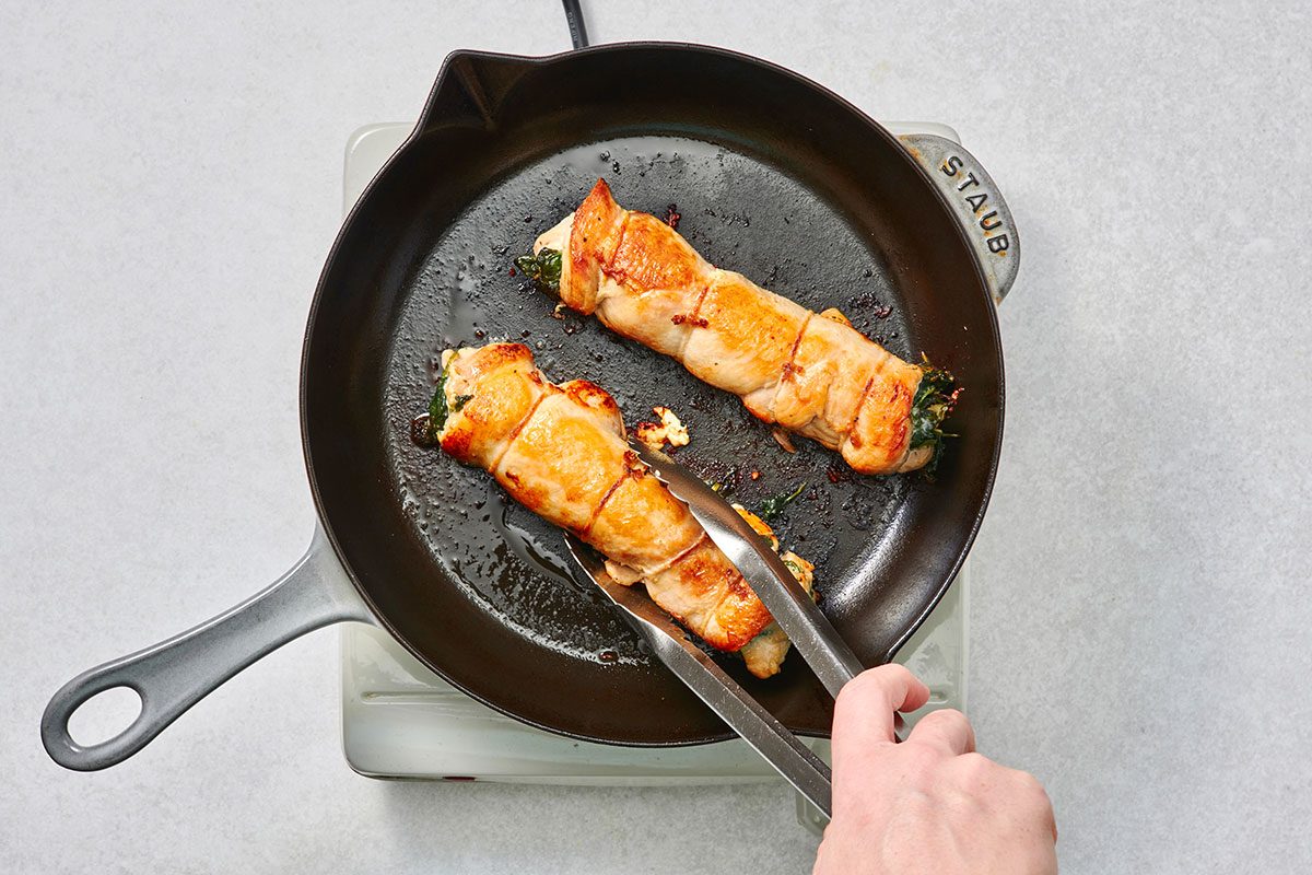 Cooked chicken in a cast iron skillet