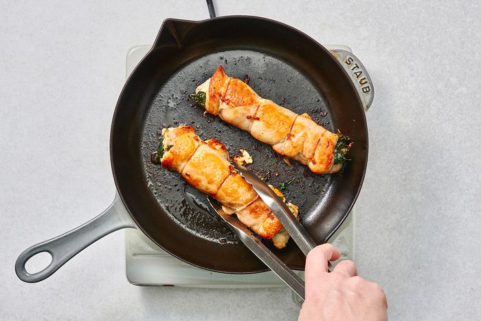 Cooked chicken in a cast iron skillet
