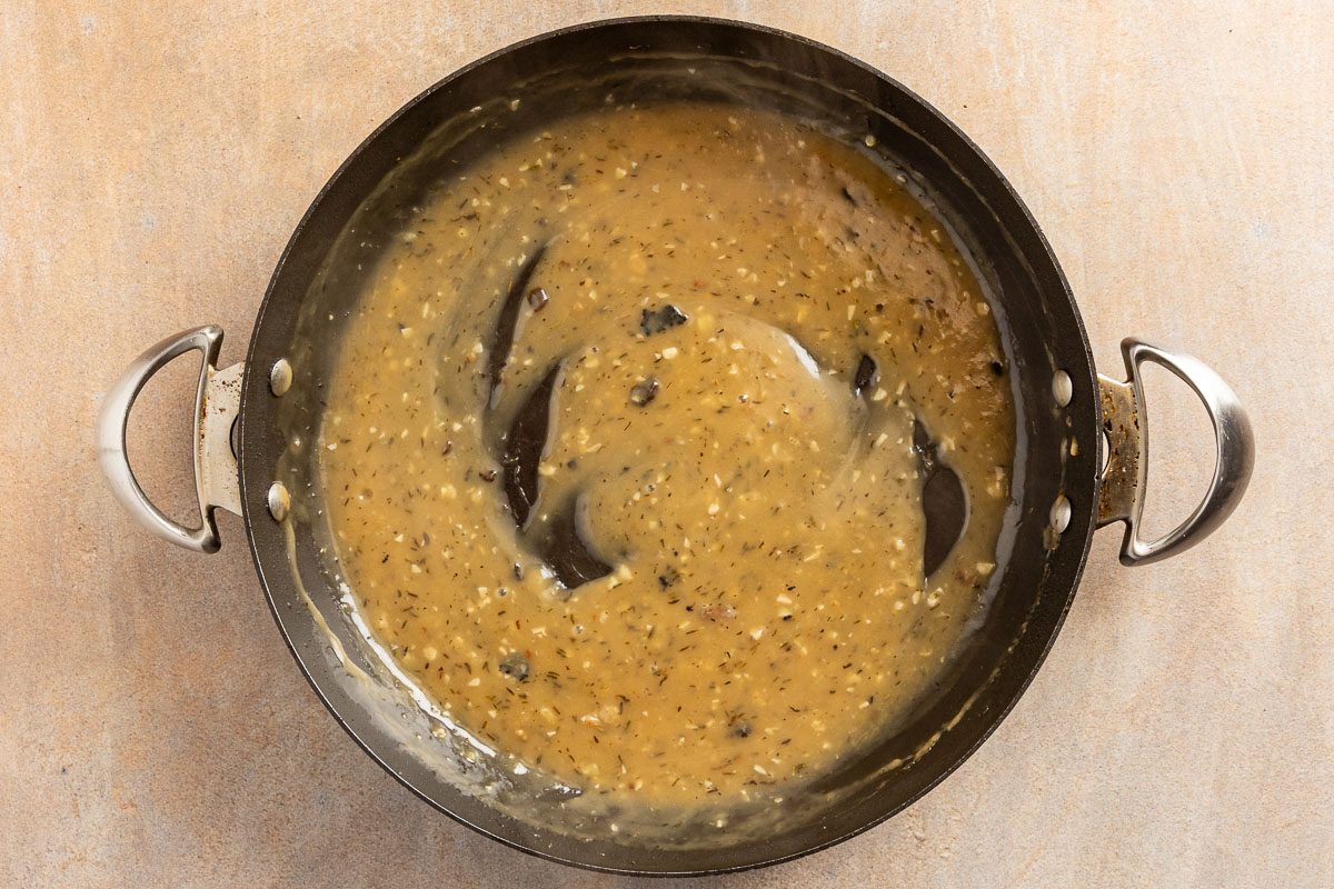 thickening gravy in a pan