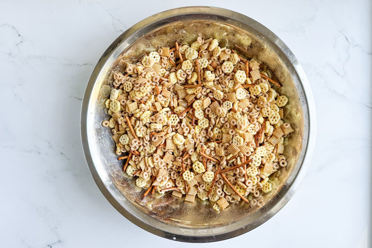 Unbaked Taste of Home Sweet and Salty Chex Mix in a metal bowl