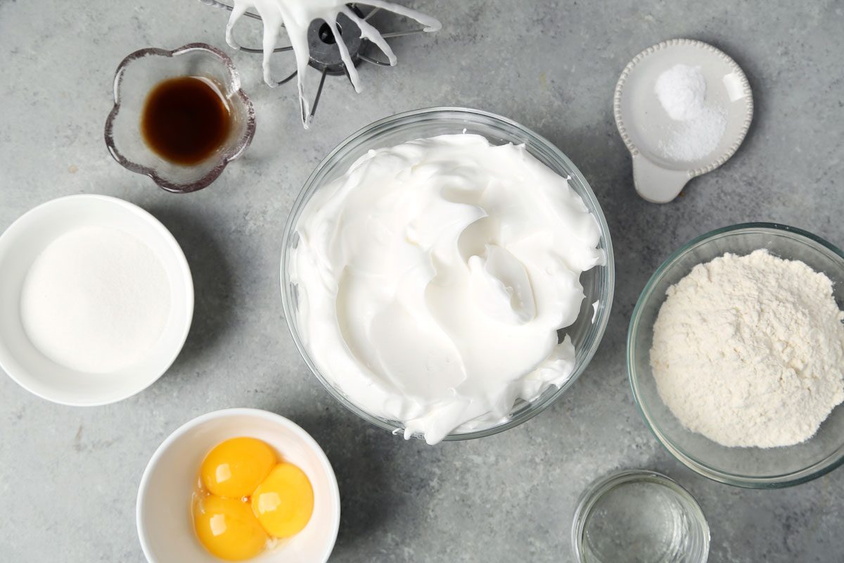 Process of making Taste of Home's Lady Fingers on a baking sheet on a wire rack.