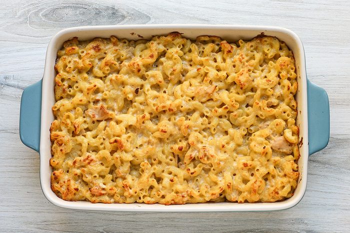 Baked tuna mac and cheese casserole cooling on a rack.