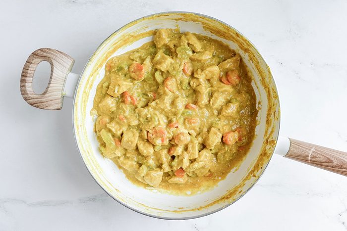 Taste Of Home Turkey Curry In A White Skillet