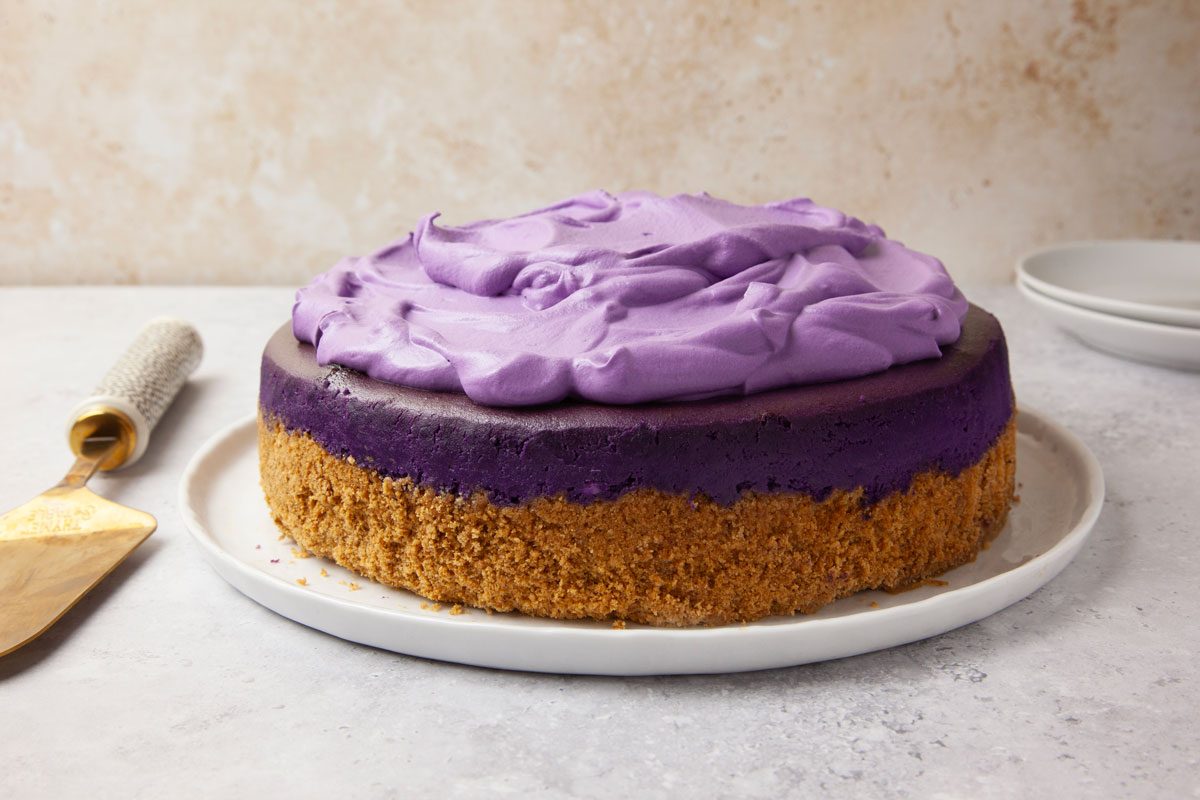 Full yield of Taste of Home Ube Cheesecake on a white background