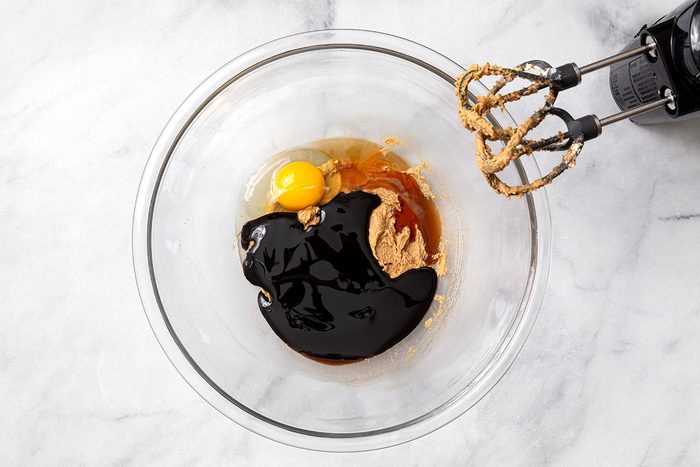 Beaten butter and brown sugar with molasses, egg and vanilla extract in a large mixing bowl or step one of Wookie Cookie recipe for Taste of Home