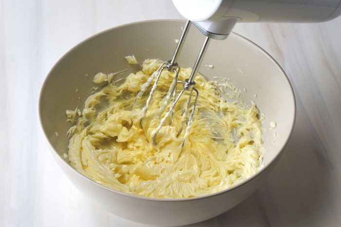 Creaming butter in a bowl