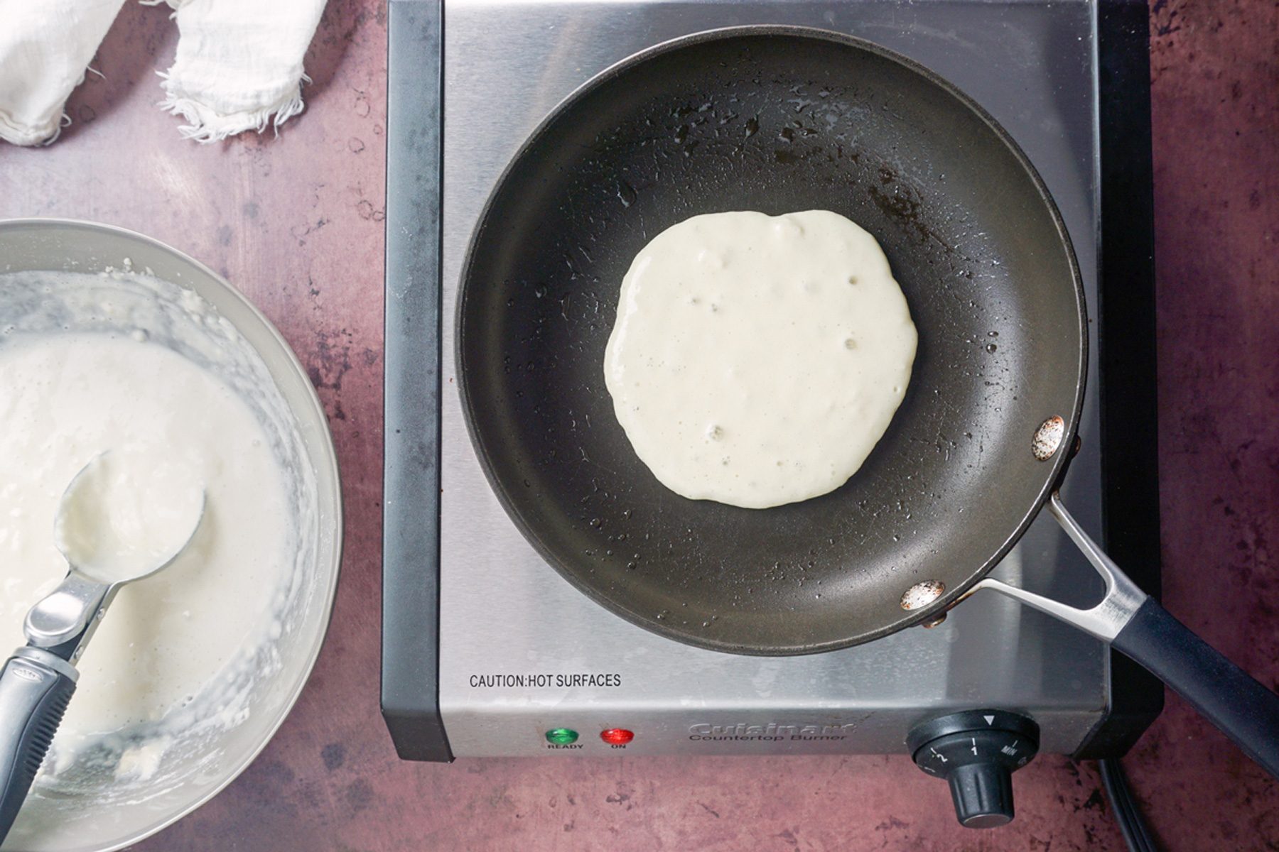 pour batter in skillet and cook pancakes