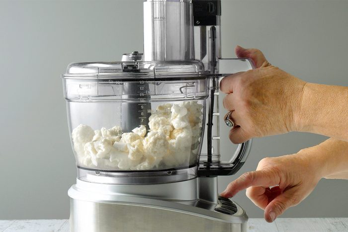 Process cauliflower in batches in a food processor until finely ground.