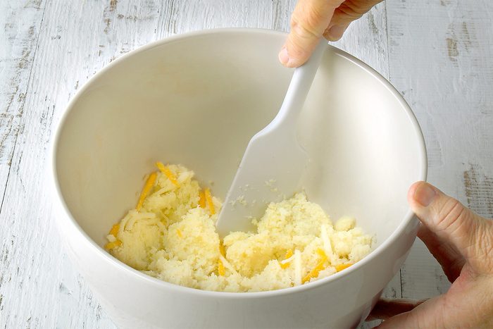 Stir half of the cheese mixture into cauliflower