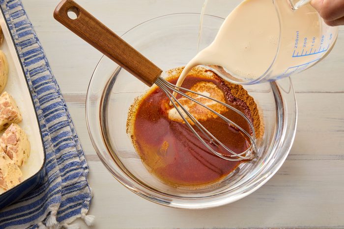 Whisked together milk, maple syrup, vanilla extract and ground cinnamon in a glass bowl