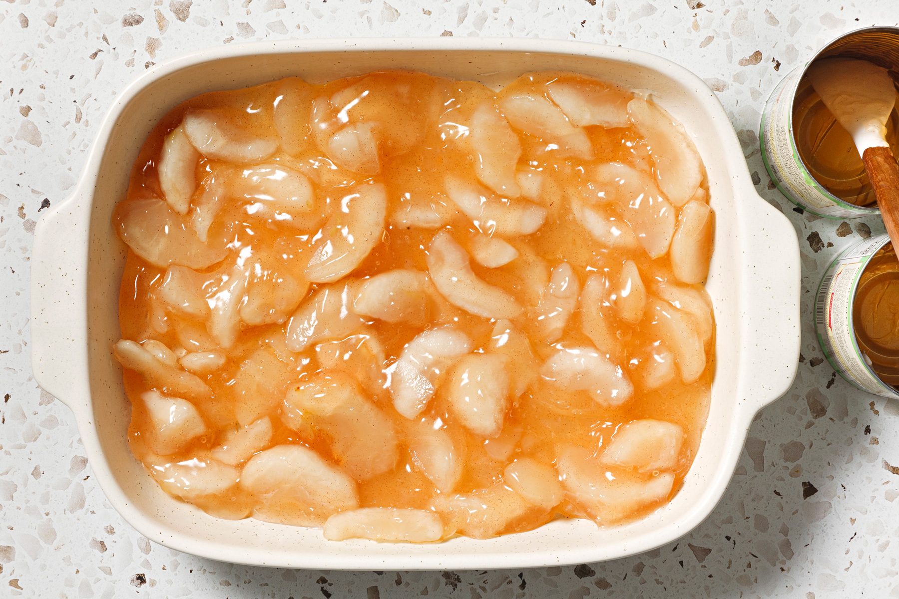 Place pie filling into greased baking dish.
