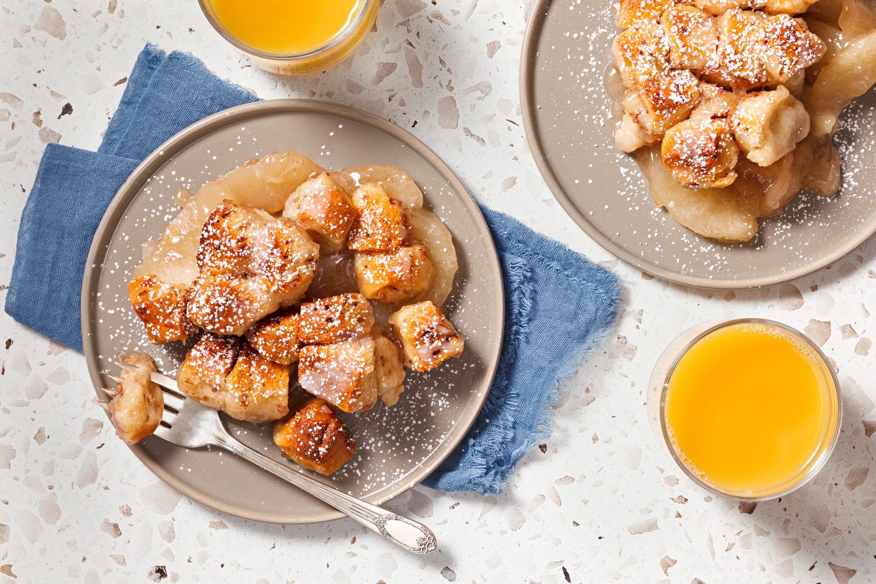 overhead shot of cinnamon rolls with apple pie filling.