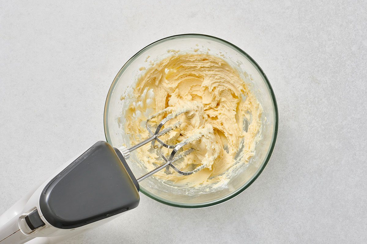 Butter, flour, and cream combined in a large bowl