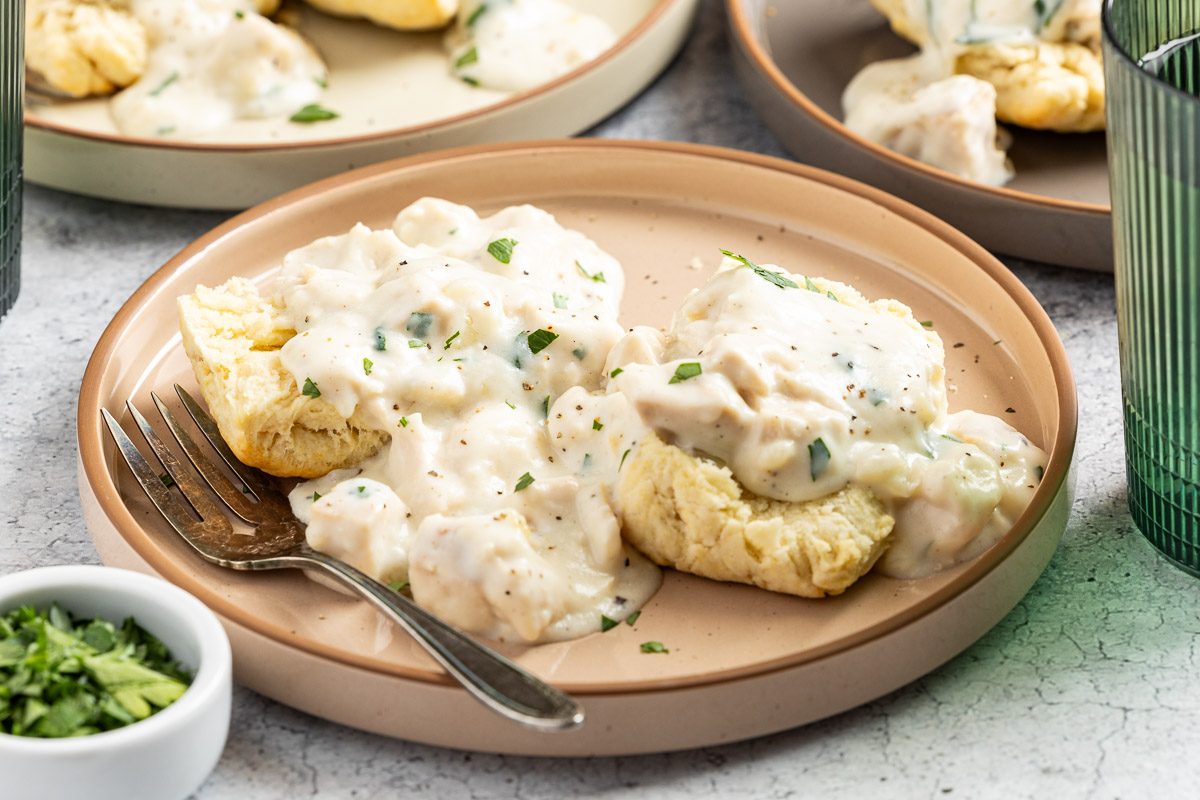 Taste of Home Creamed Chicken over Biscuits photo of the finished recipe.