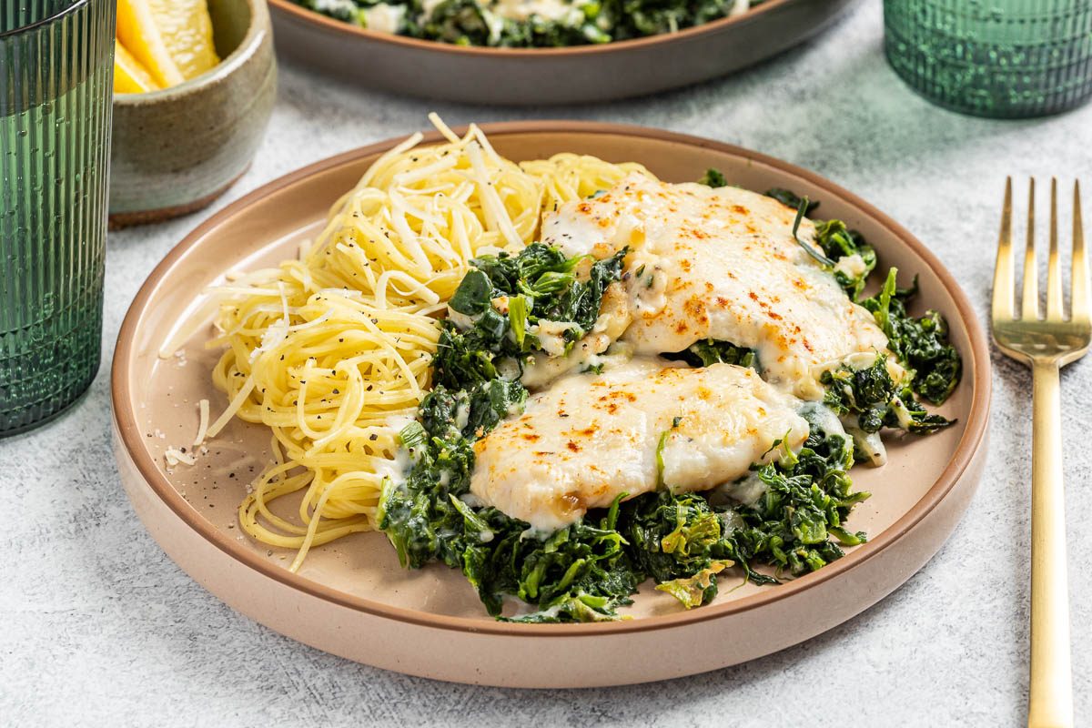 Taste of Home Flounder Florentine photo of the finished recipe served on plates.