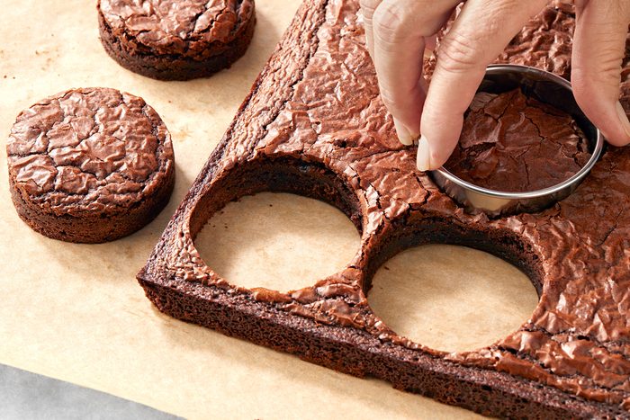 Cutting brownie into piece using a cookie cutter