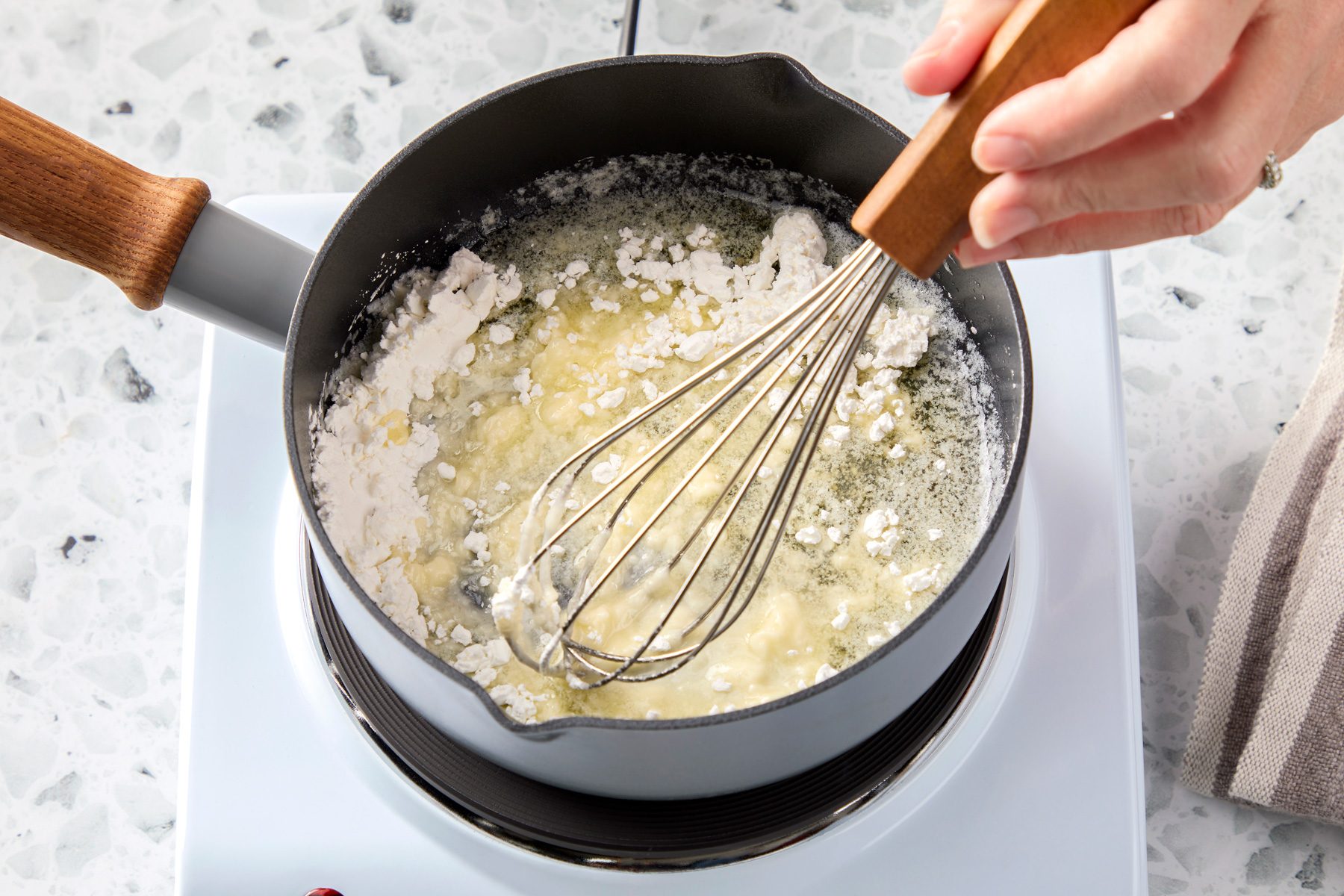 Whisk constantly until the mixture becomes lightly bubbly and smooth.