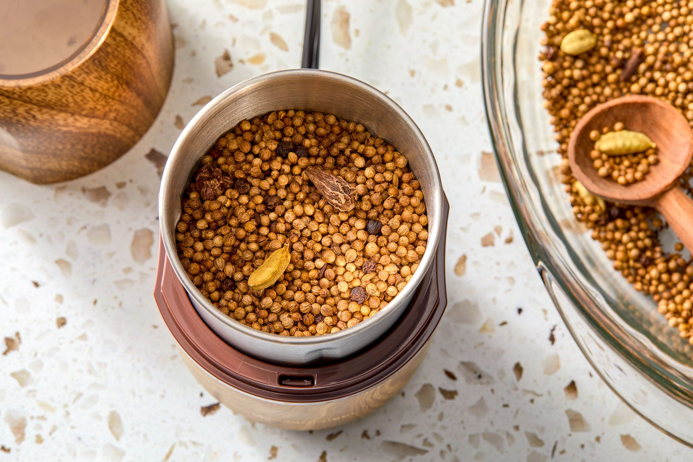 Roasted spices in a grinding jar