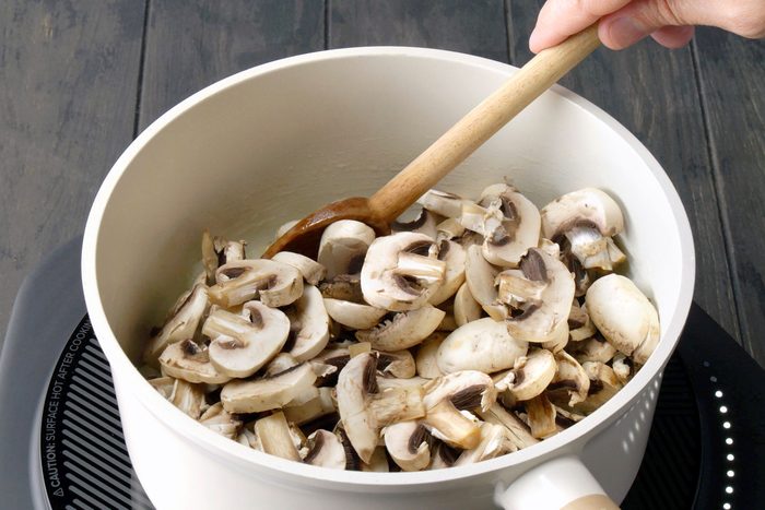 Mushrooms saute in a pan