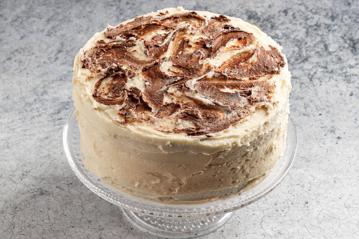 Taste of Home Marble Cake photo of adding the chocolate decoration.