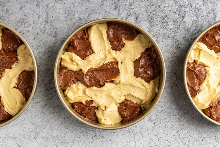 Taste of Home Marble Cake photo of the marble batter in the cake pans.