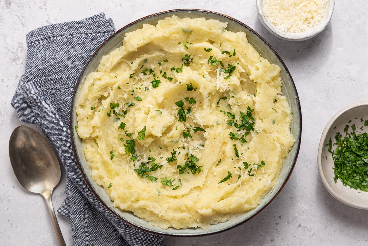 Parmesan Mashed Potatoes In Serving Plate With Parsley