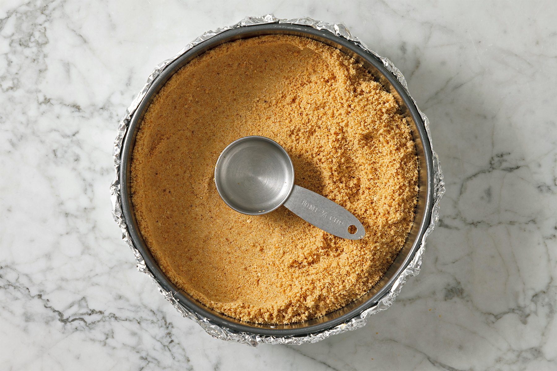 Press crumb mixture into the bottom of prepared pan
